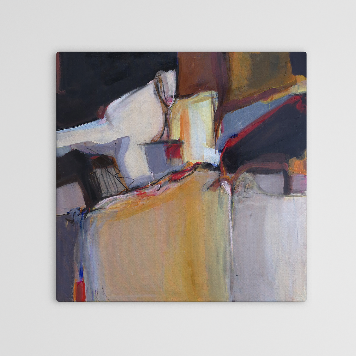 An abstract canvas painting featuring expressive brushstrokes in mustard yellow, cream, gray, black, and brown, displayed against a neutral light gray background.