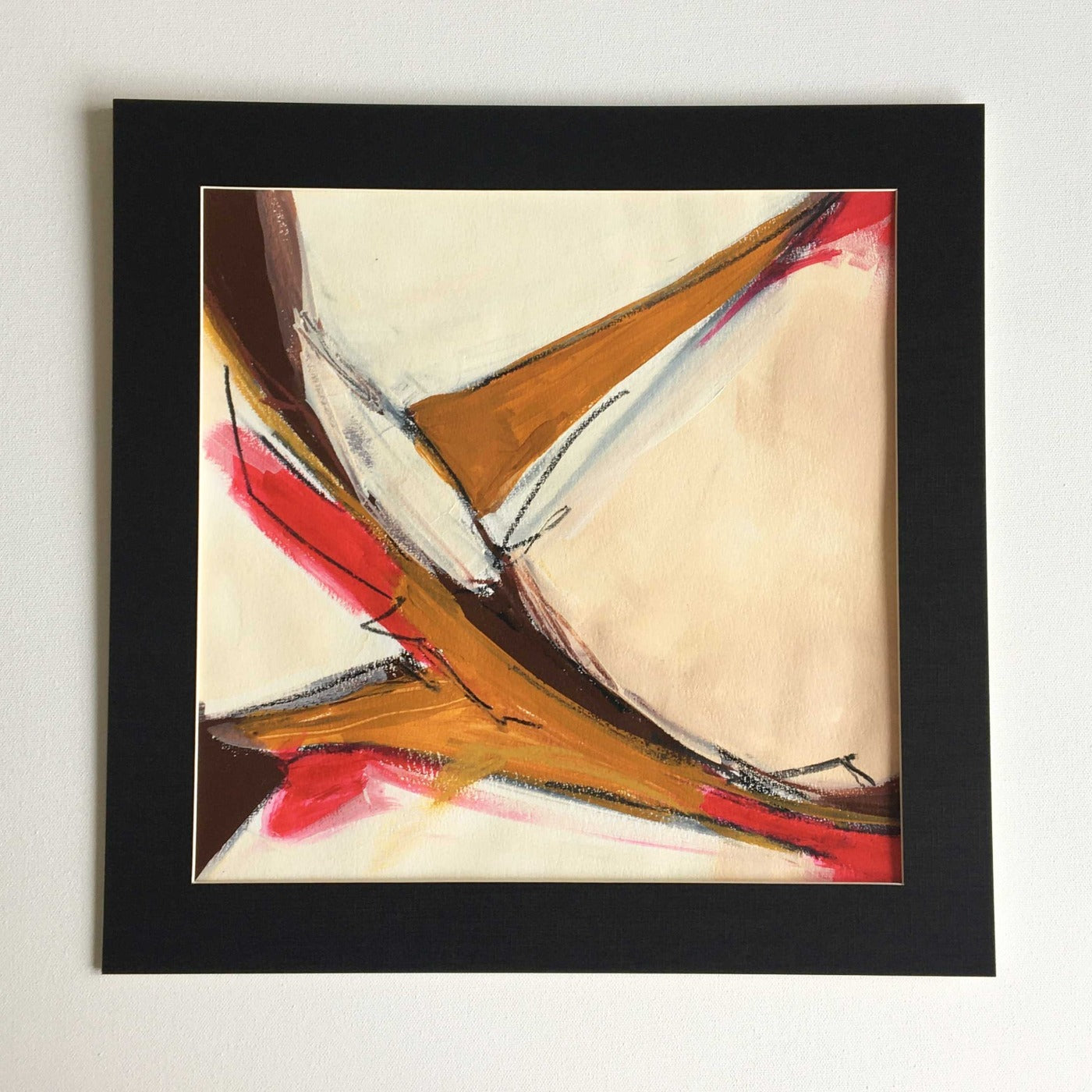 One-of-a-kind mixed media artwork in light yellow, warm white, raw sienna, brown, red and black colors. Intuitive landscape composition in the artist's art practice. Framed in black, matt paper frame. 