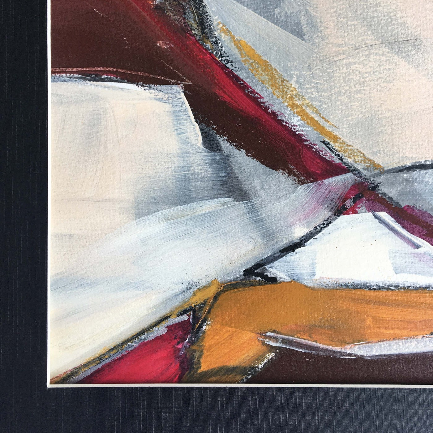 One-of-a-kind mixed media artwork in warm gray, white, Naples yellow light, red, raw sienna, and black colors. Intuitive composition in the artist's art practice. Framed in black, matt paper frame. Detail