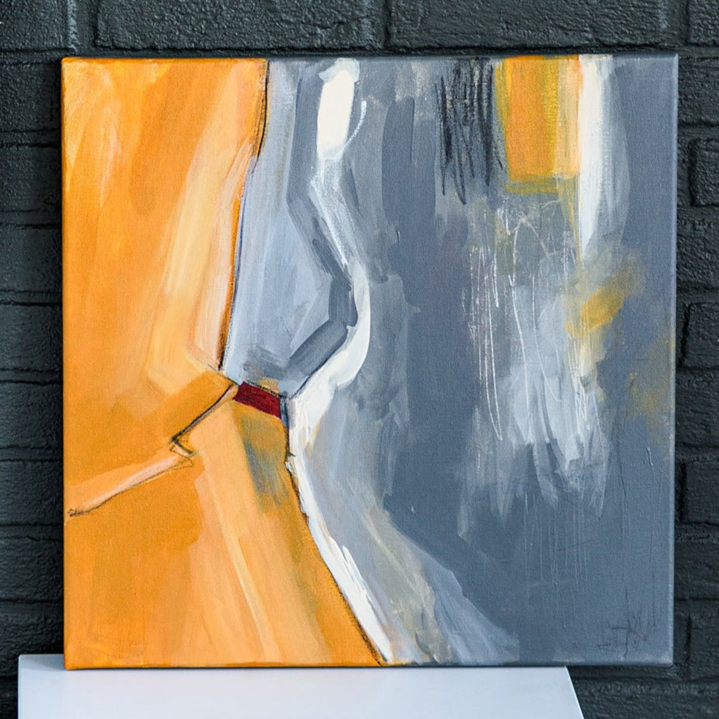 Abstract painting in raw sienna, gray, white and red color. The painting is made of acrylic color and mixed media. Mockup