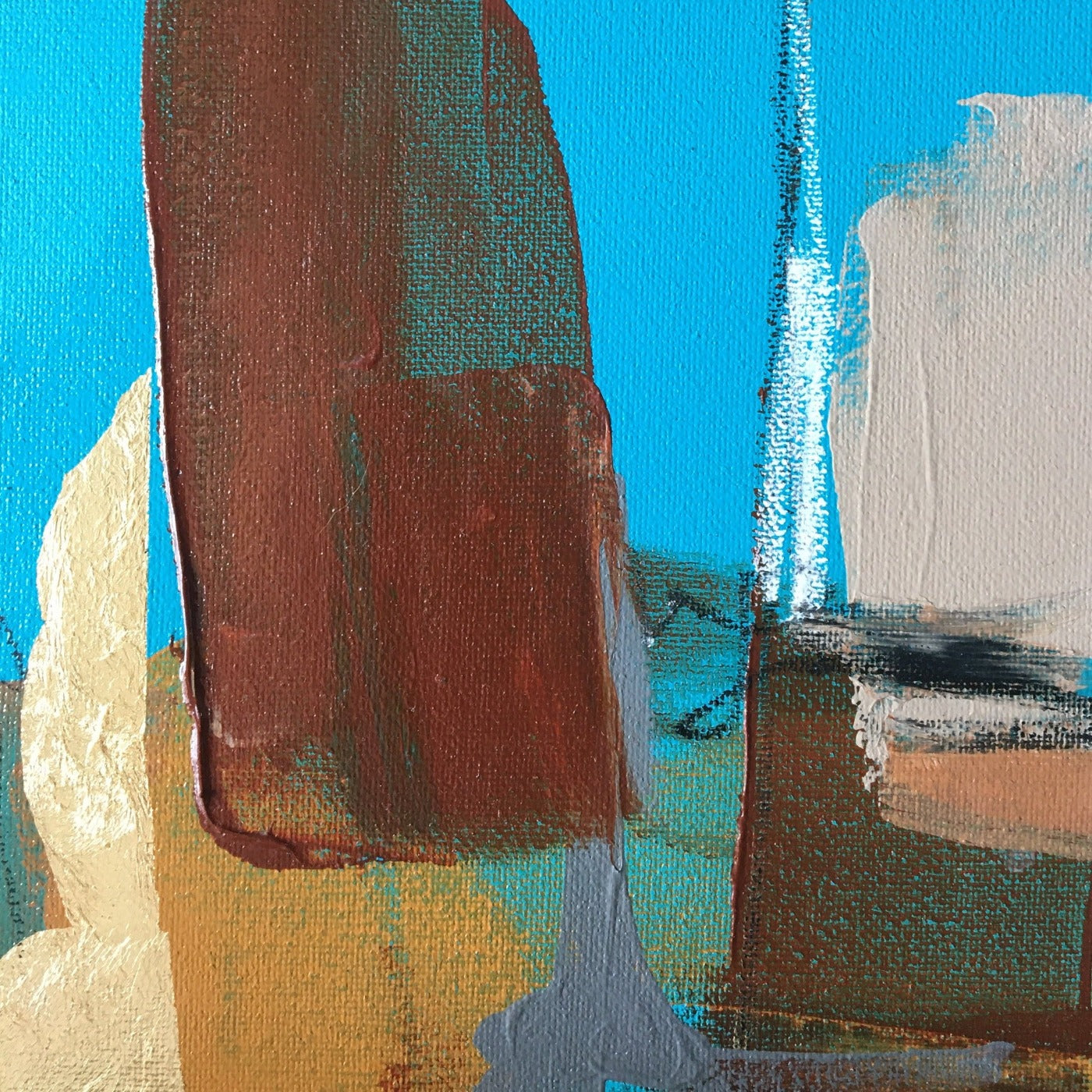 Abstract painting in burnt sienna, light blue, white colors, and gold foil. The artwork is made with acrylic colors and mixed media. Detail