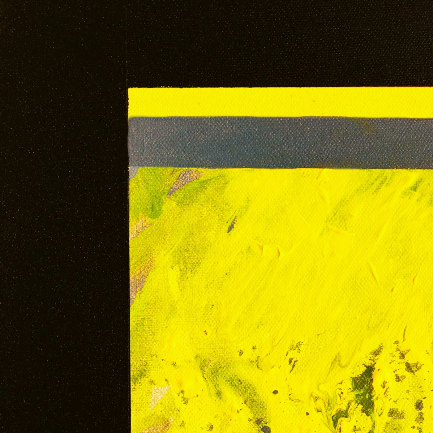 Abstract painting in yellow, black, gray and white colors. The artwork is made with acrylic colors. Detail