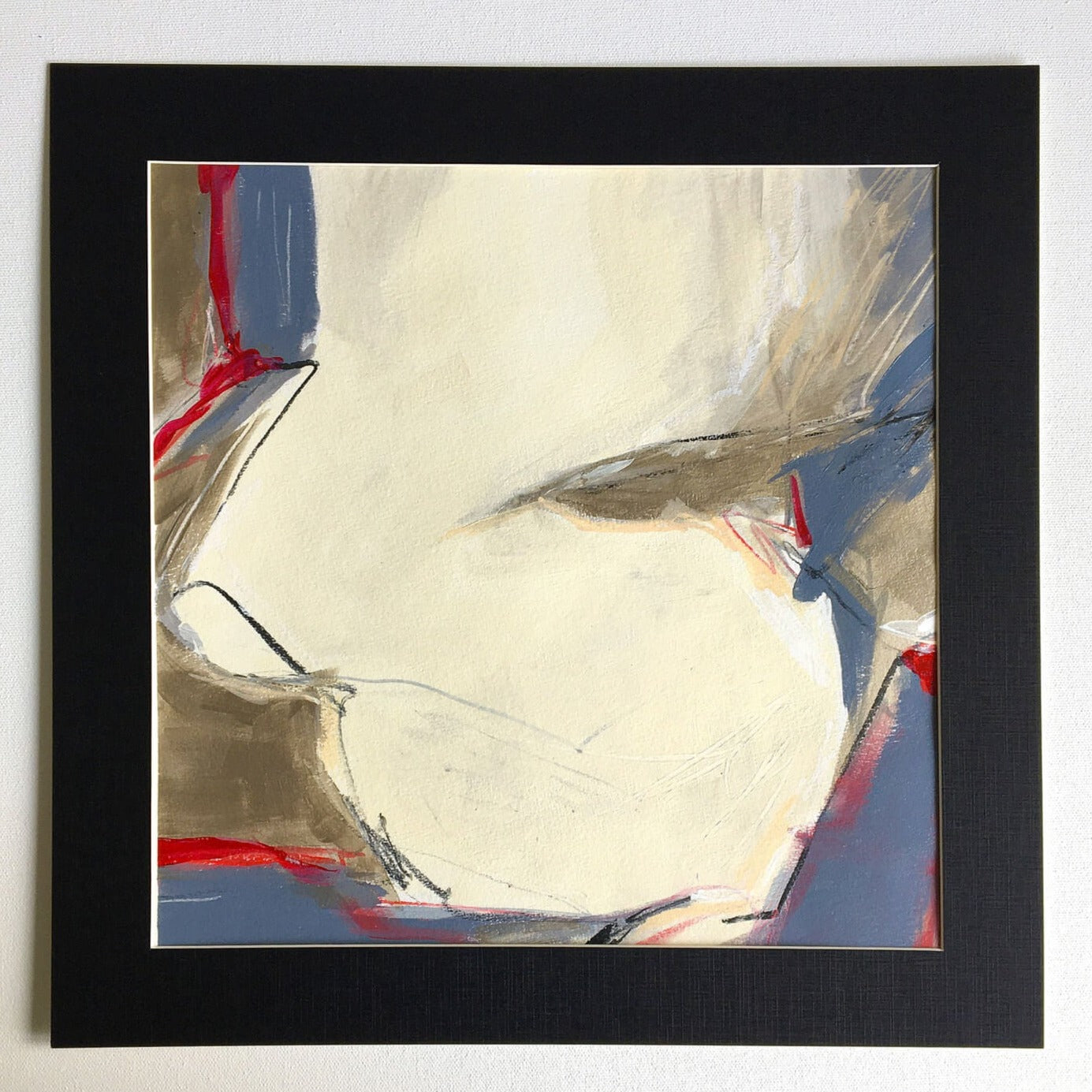 One-of-a-kind mixed media artwork HOLIDAY LANDSCAPE on paper in white, red, and black colors. Intuitive and dynamic composition in the artist's art practice. Framed in black, matt paper frame.