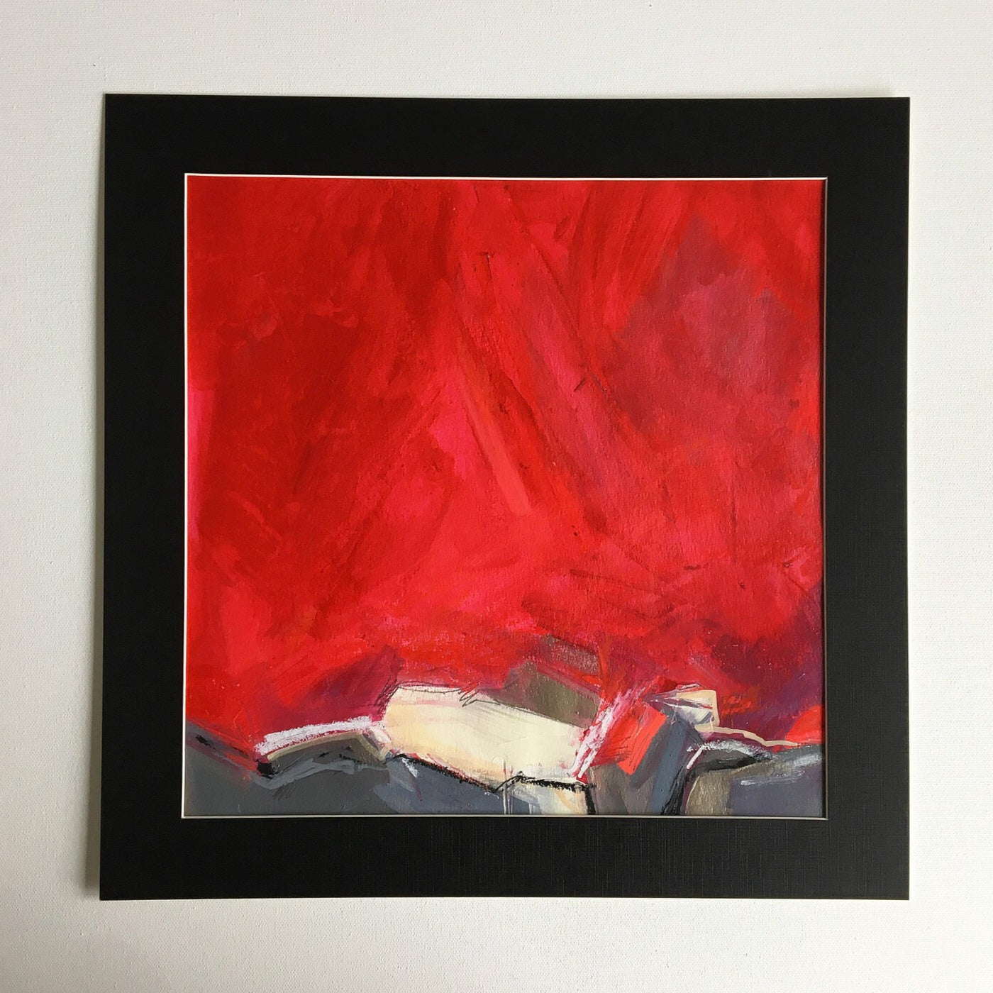 One-of-a-kind mixed media artwork SUNSET on paper in white, red, and black colors. Intuitive and dynamic composition in the artist's art practice. Framed in black, matt paper frame.