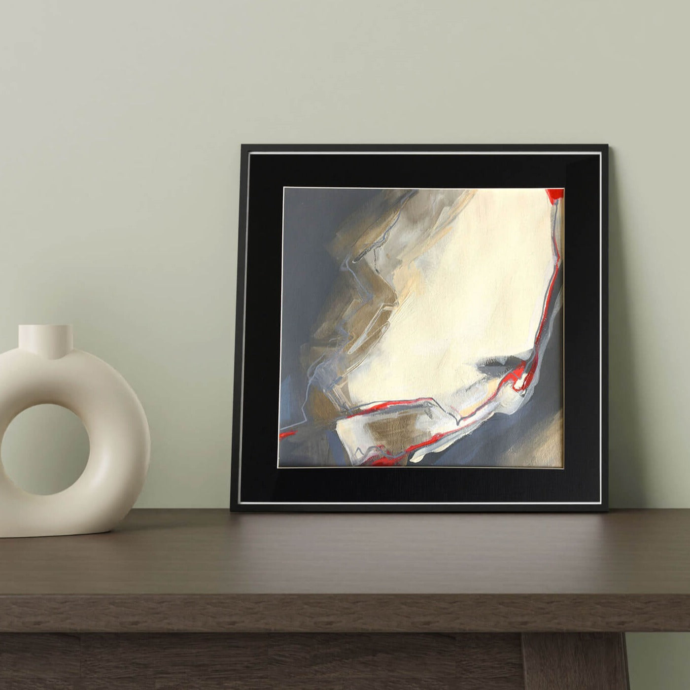 One-of-a-kind mixed media artwork on paper in white, red, and black colors. Intuitive and dynamic composition in the artist's art practice. Framed in black, matt paper frame. Mockup