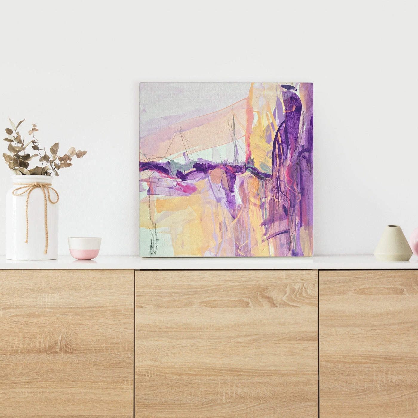 Abstract painting in naples yellow, violet, lilac, and pink colors. The artwork is made with acrylic colors and mixed media. Mockup